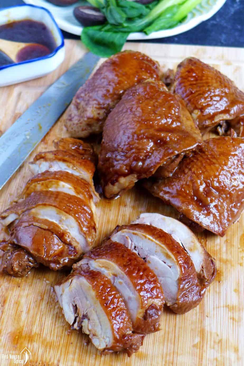 Soy sauce chicken on a chopping board