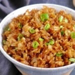 Chinese soy sauce fried rice in a bowl.