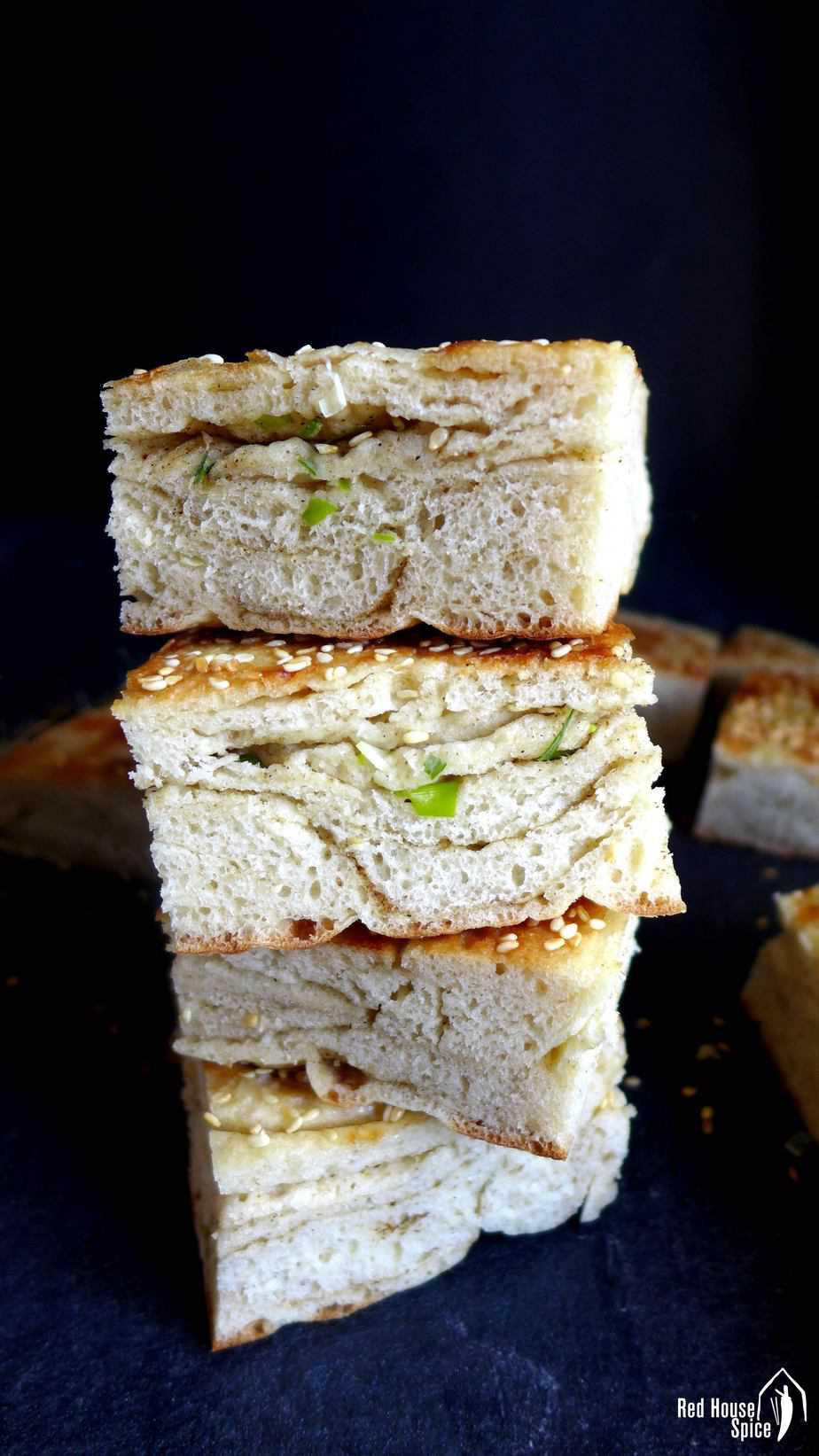 Four pieces of scallion flatbread