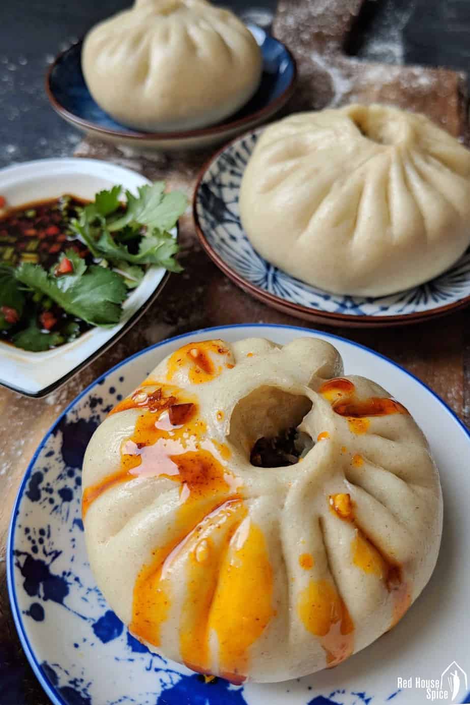 Steamed bao bun dressed with chilli oil.