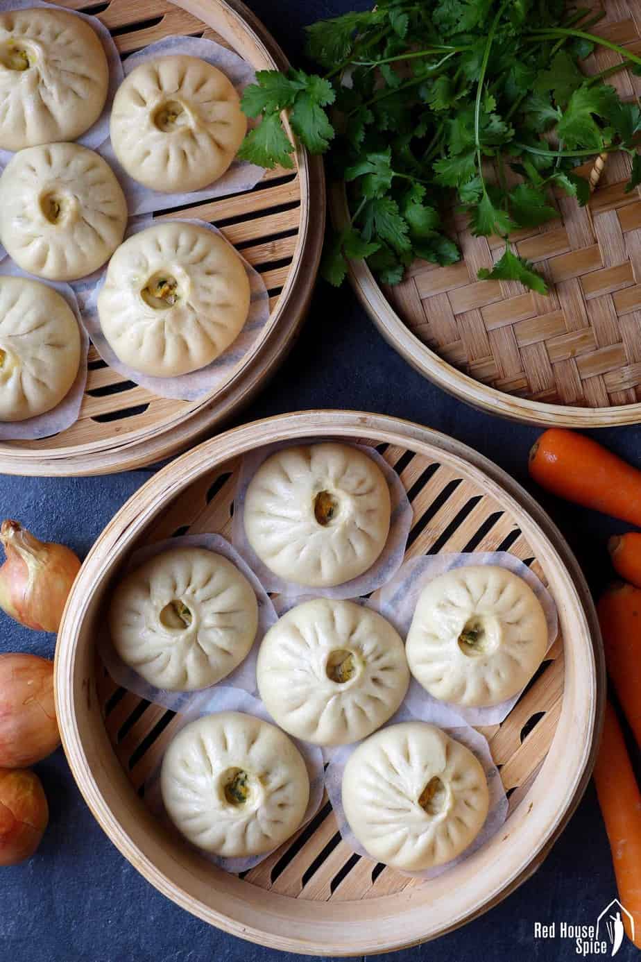 Stuffed bao buns in steamers