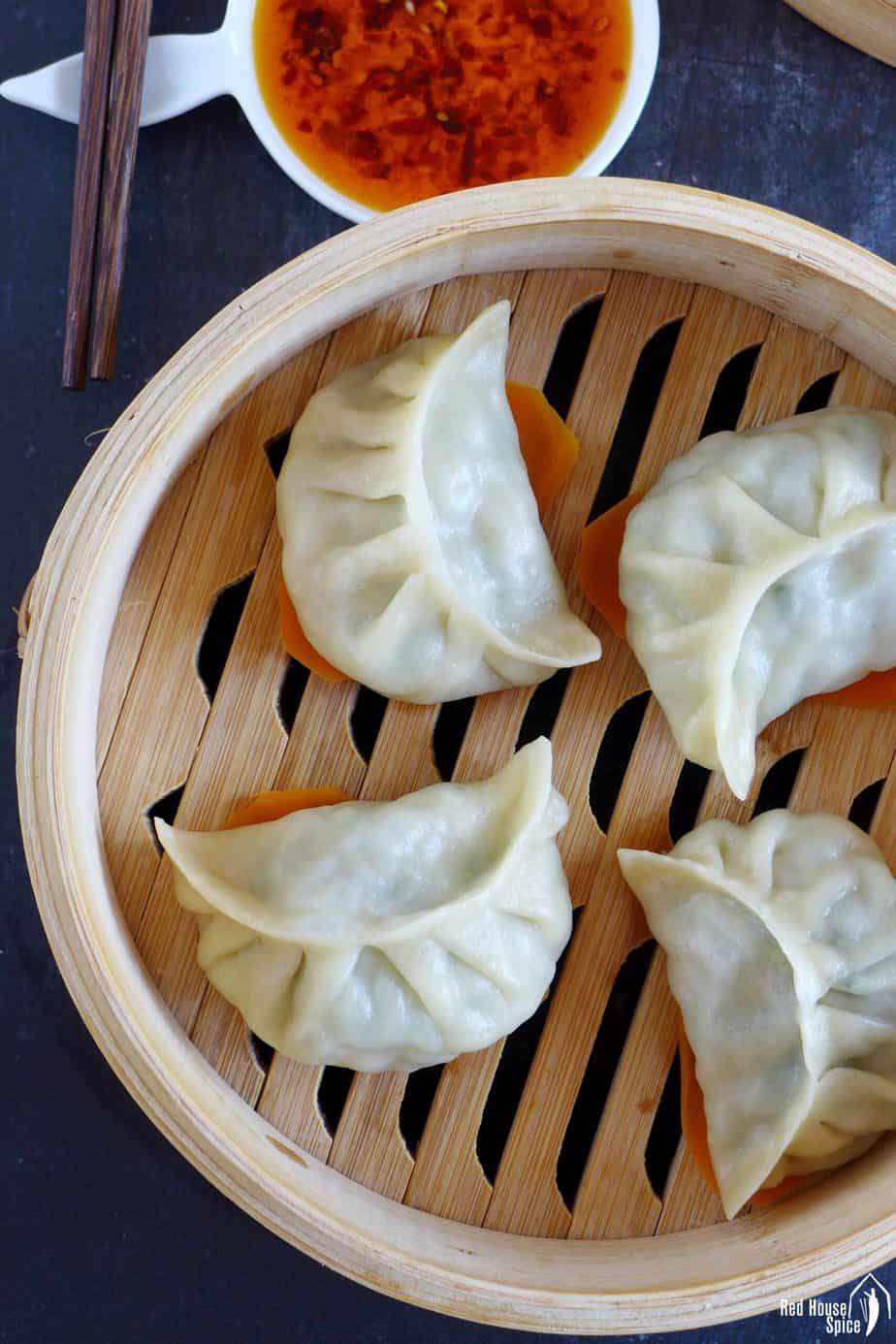 dumplings in a steamer basket