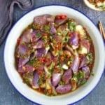 a plate of steamed eggplant with chili garlic dressing