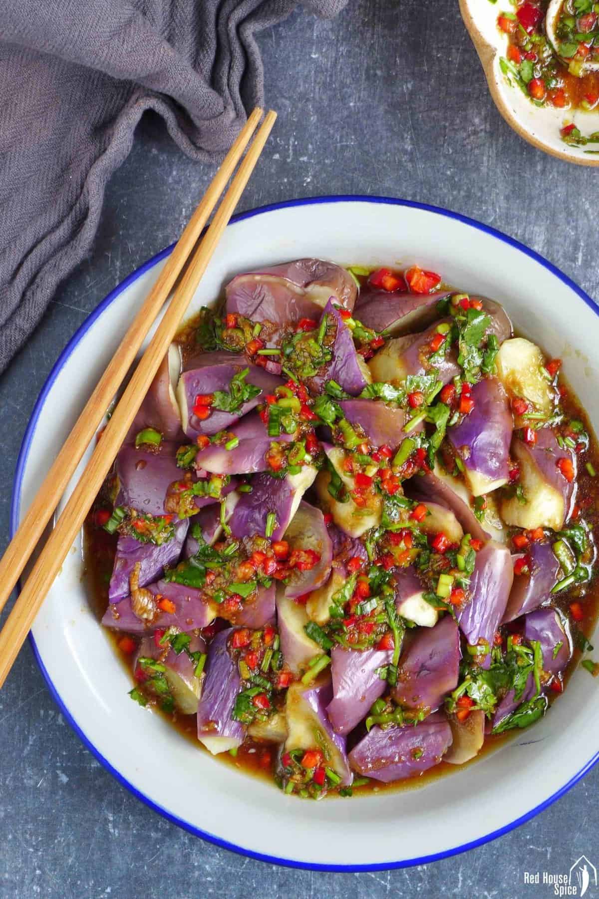 a plate of steamed eggplant with chili garlic dressing