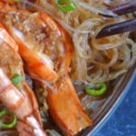 chopsticks picking up vermicelli.