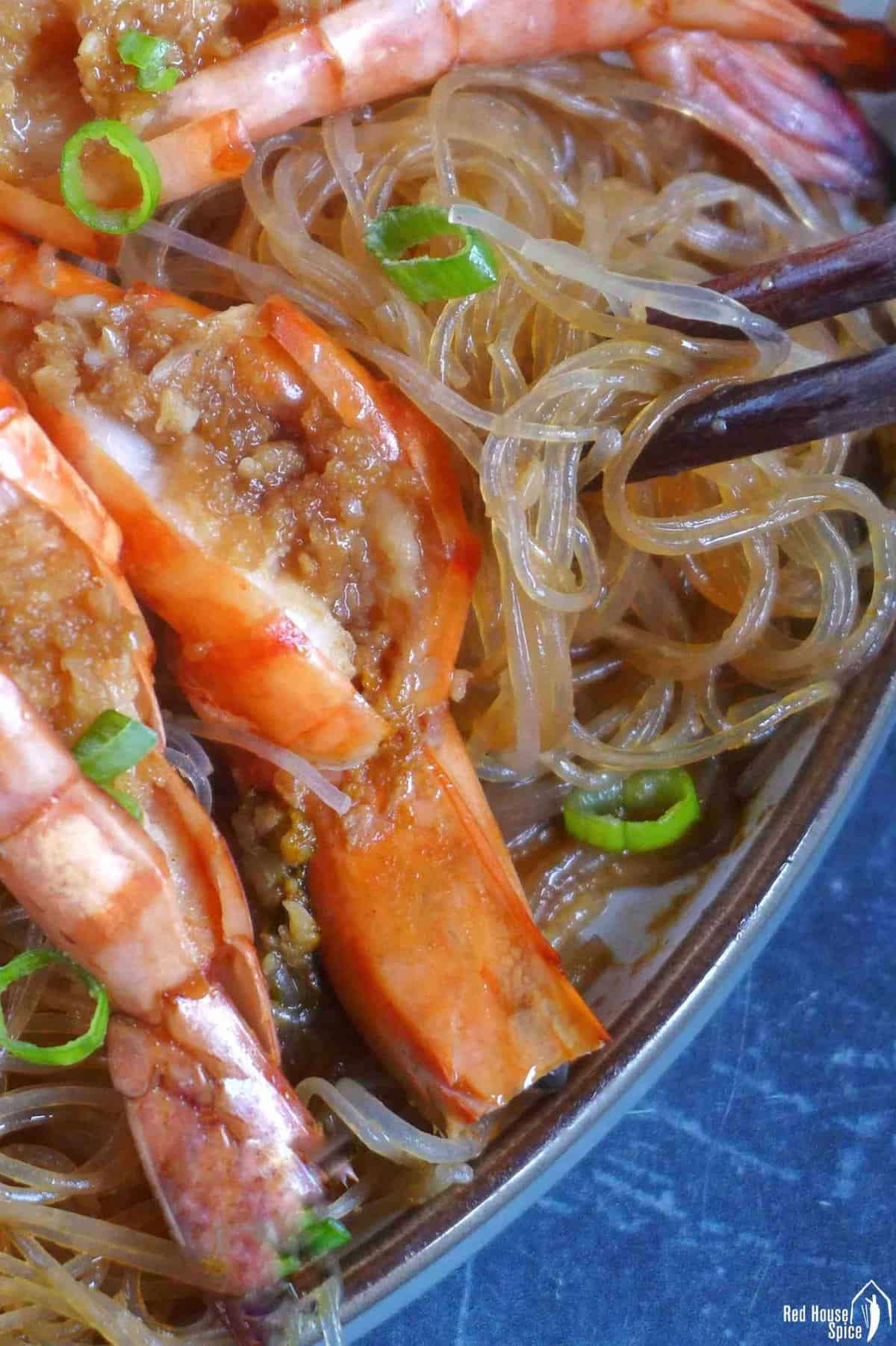 chopsticks picking up vermicelli.