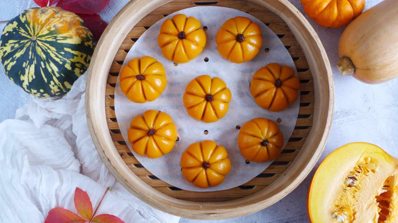 Eight pumpkin cakes in a steamer