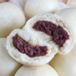An open red bean bun