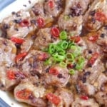 a plate of steamed ribs with fermented black beans and chili pepper.