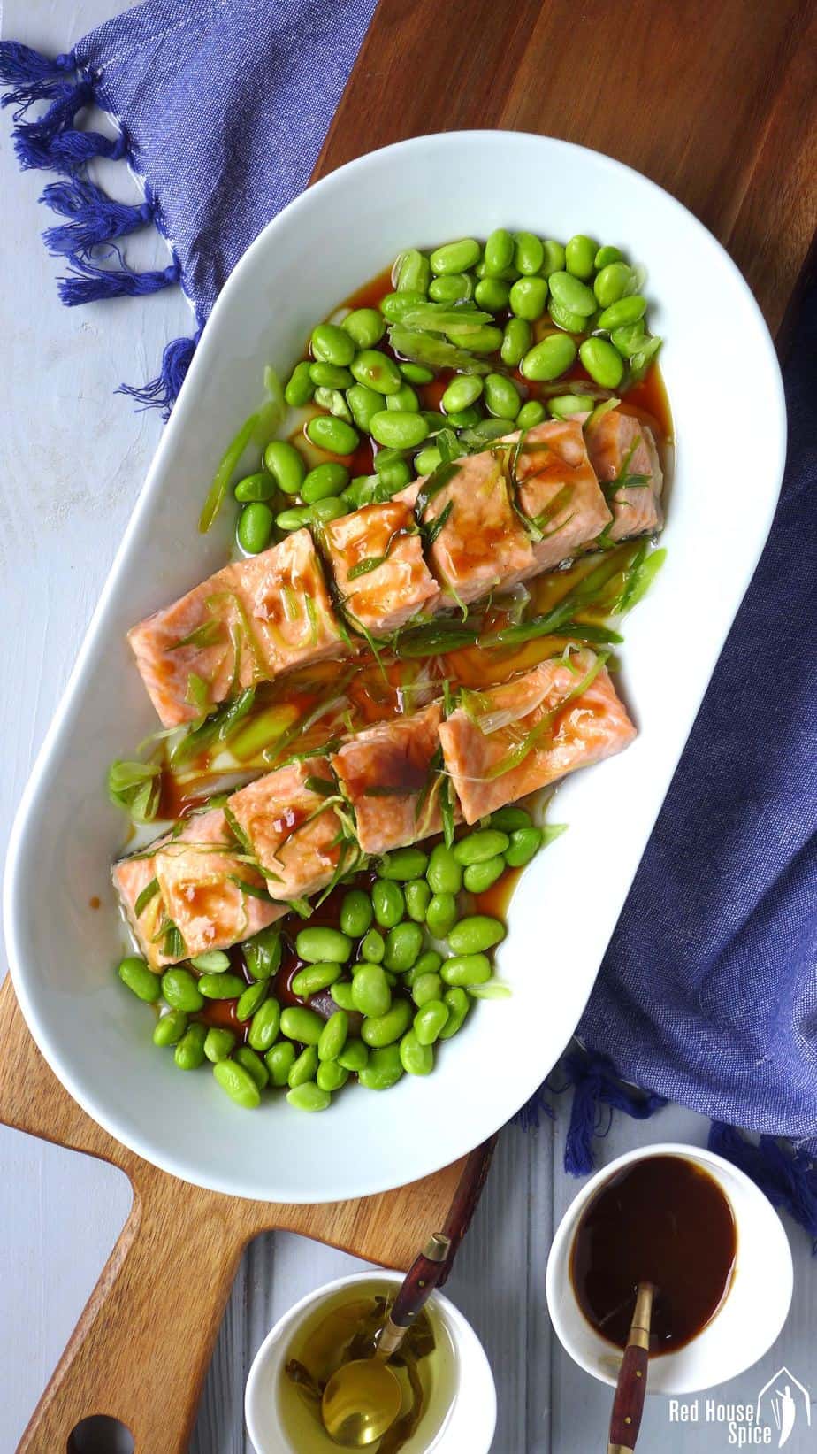 A healthy, tasty dish ready in 10 minutes. Steamed salmon fillets with homemade spring onion oil is aromatic, moist and tender.