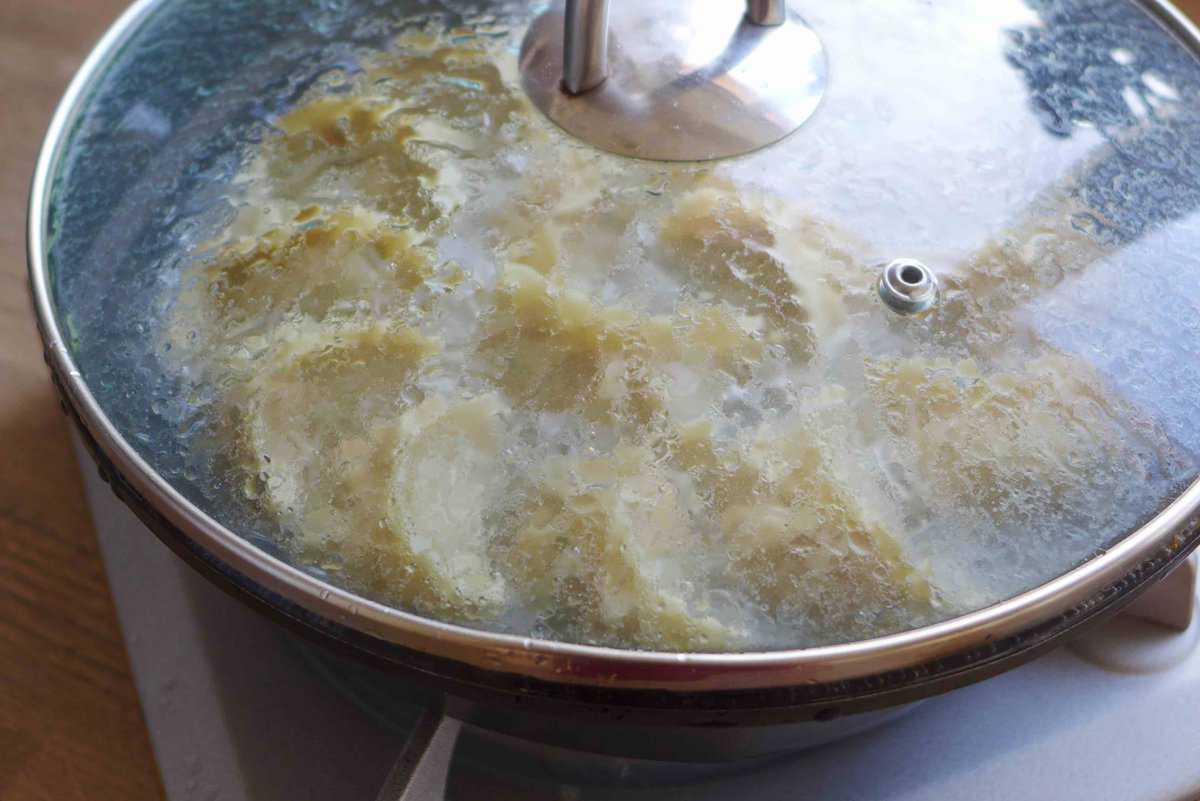 cooking dumplings with a lid on.