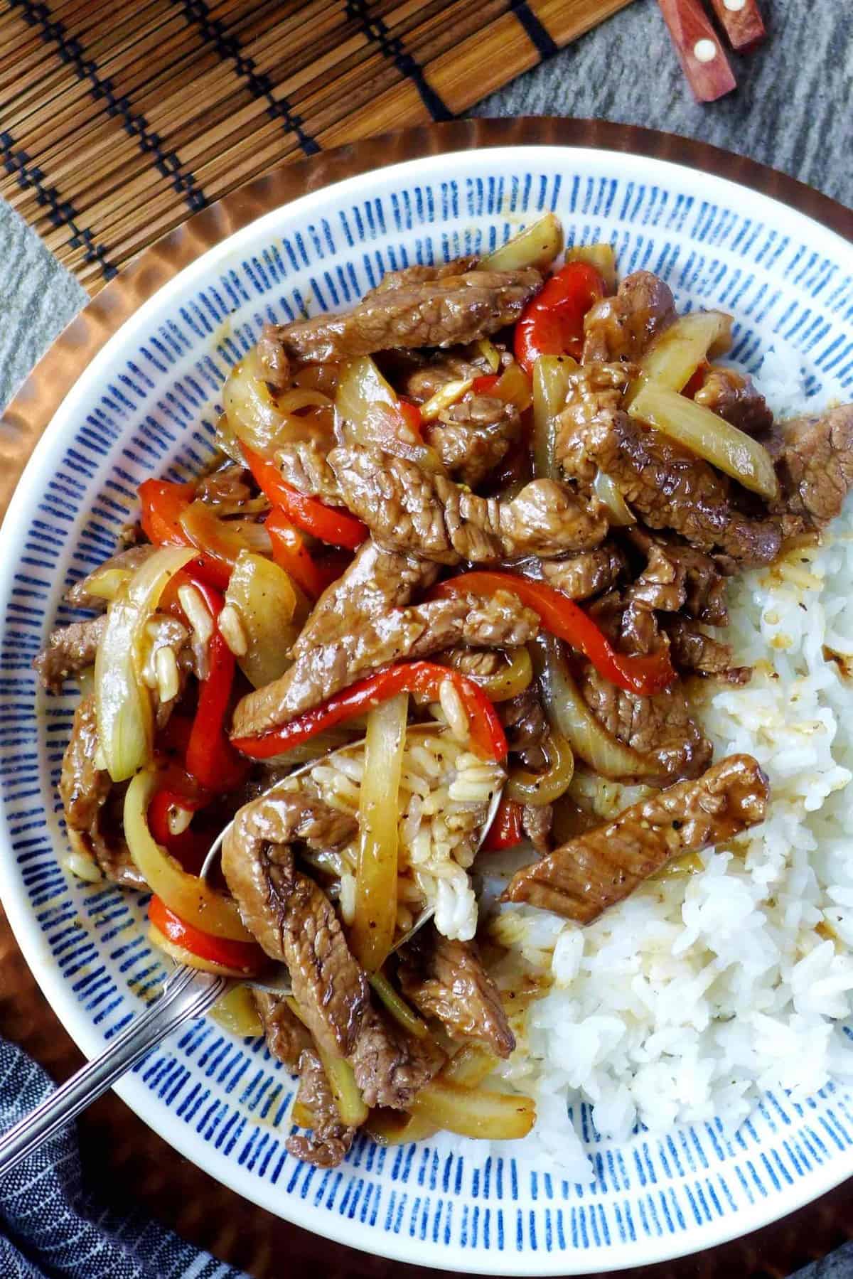 Stir-fried black pepper beef over rice