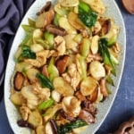 a plate of chinese rice cake stir-fry.