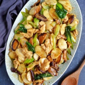 rice cakes stir-fried with chicken, mushrooms and Bok Choy.