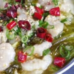 fish slices in a hot broth with pickled mustard greens.