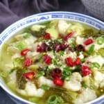 a bowl of Suan Cai Yu, Sichuan fish with sour vegetable
