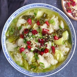 a bowl of Suan Cai Yu, Sichuan fish with sour vegetable