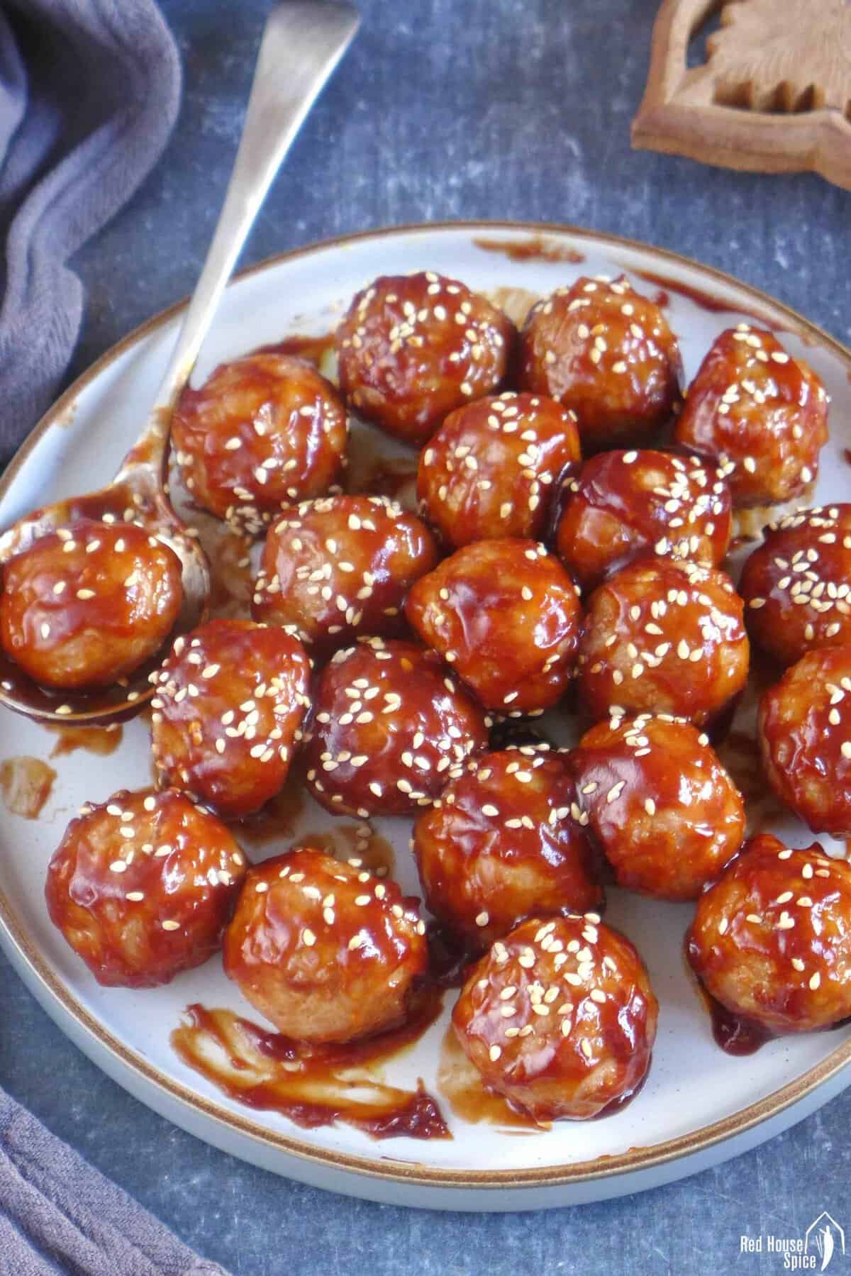 Chinese sweet and sour meatballs on a plate.