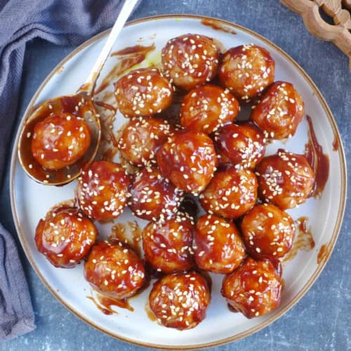 Chinese sweet and sour meatballs on a plate.