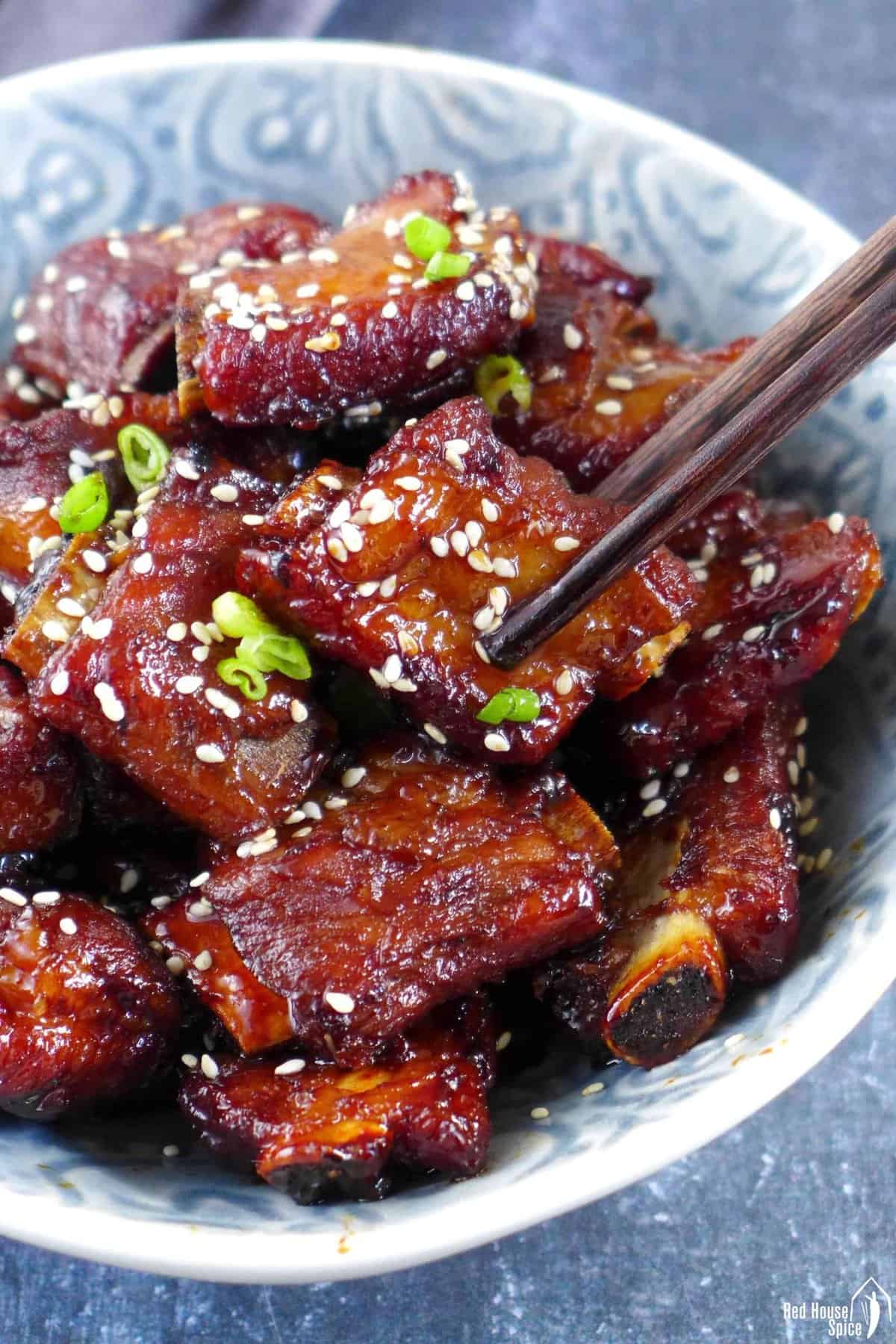Chinese Sweet and sour ribs with a pair of chopsticks