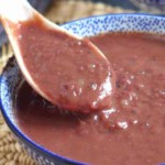 spooning red bean soup with overlay text that says sweet red bean soup.