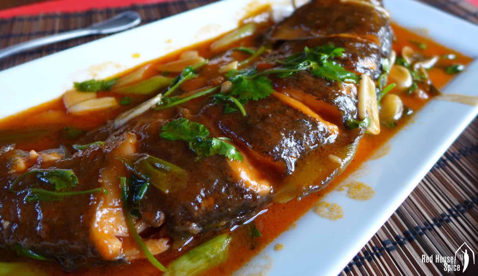 Fish covered with sweet & sour sauce