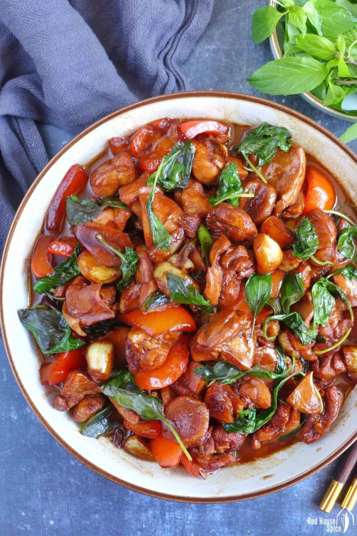 a plate of three cup chicken.