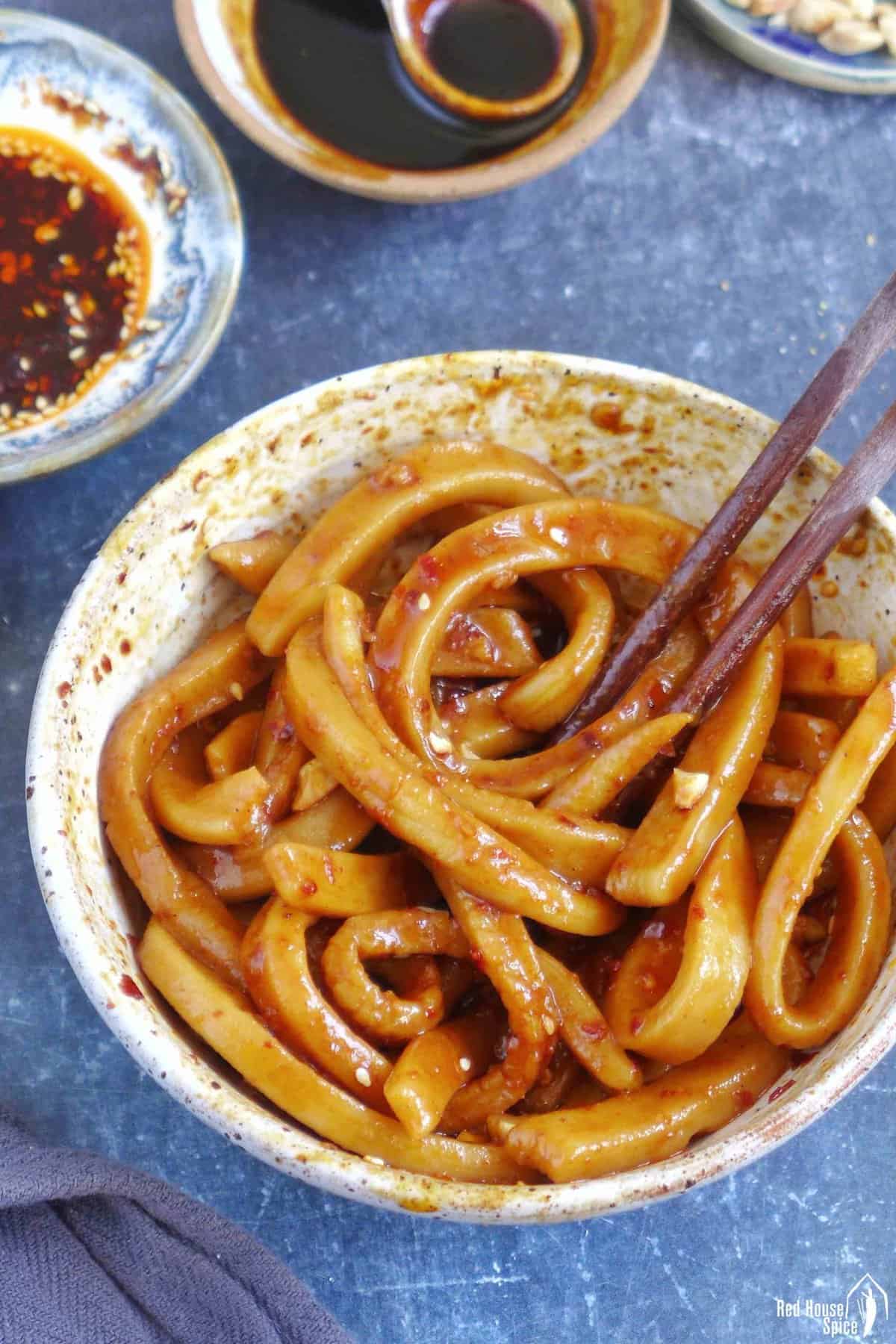 A bowl of Tian Shui Mian with thick sauce.