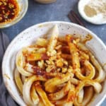 Sichuan Tian Shui Mian with seasonings on the side.