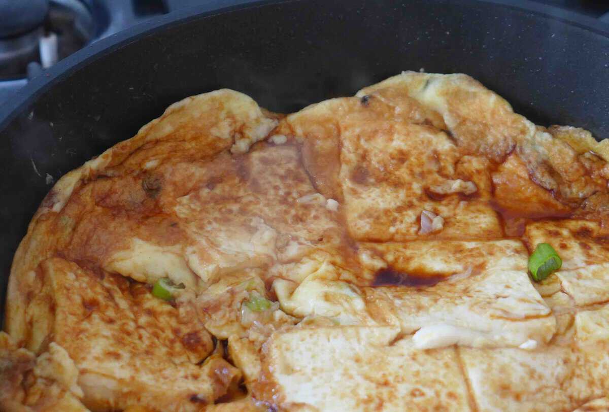 cook omelet with seasonings.