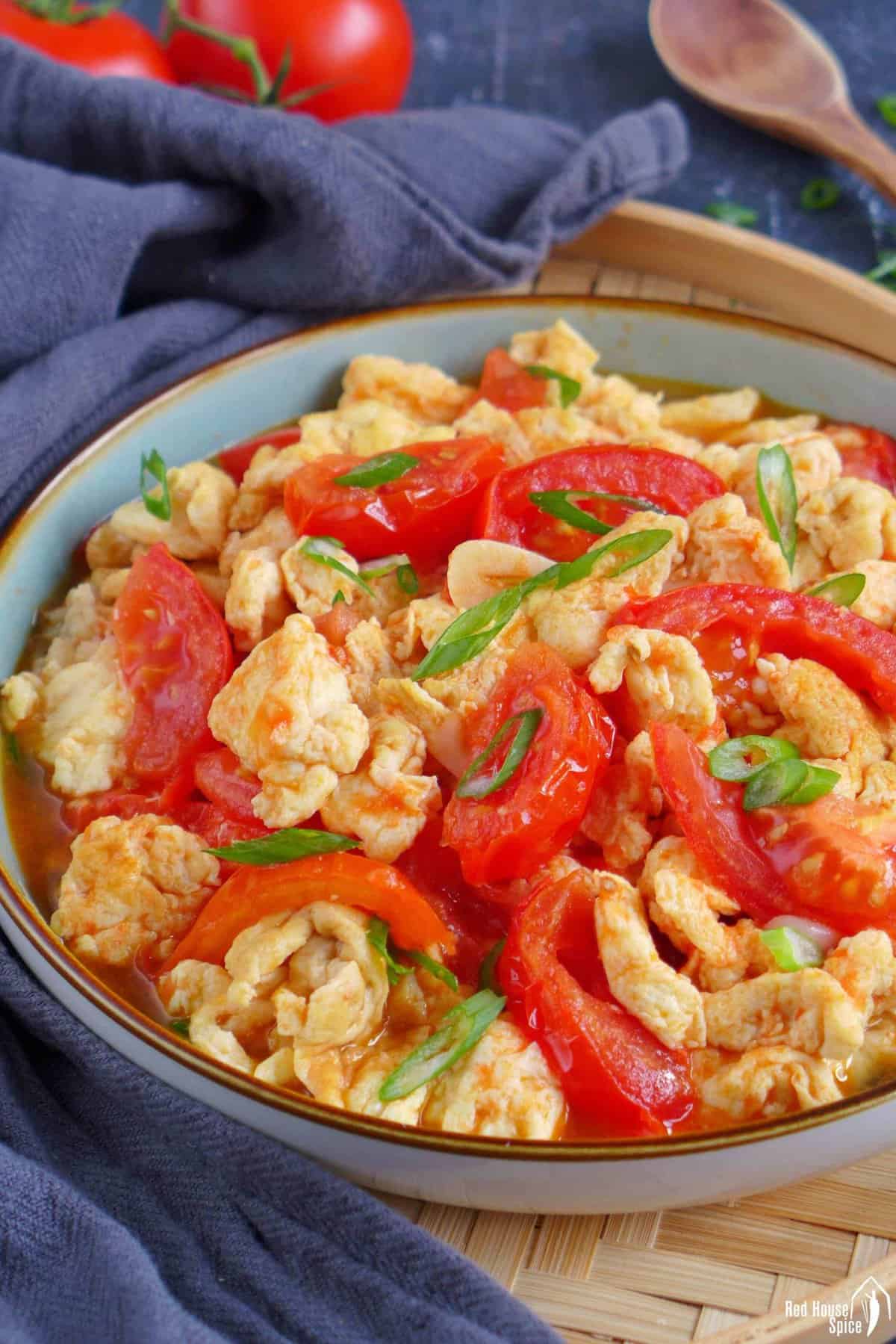 A plate of stir-fried tomato and egg.
