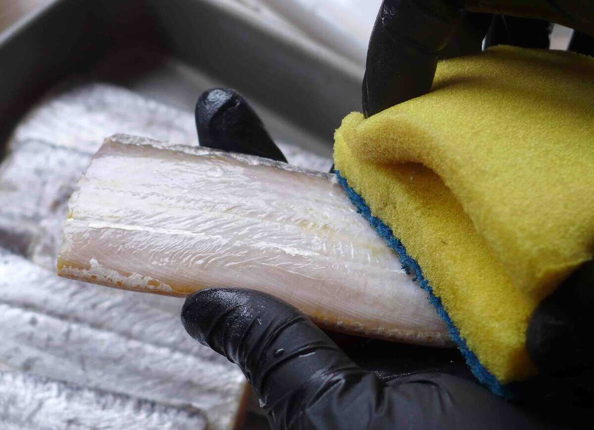 removing the silver coating on belt fish.