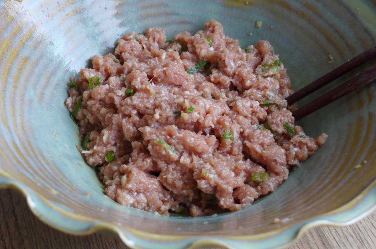 minced pork wonton filling in a bowl.