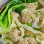 A bowl of wonton soup with overlay text that says easy wonton soup.