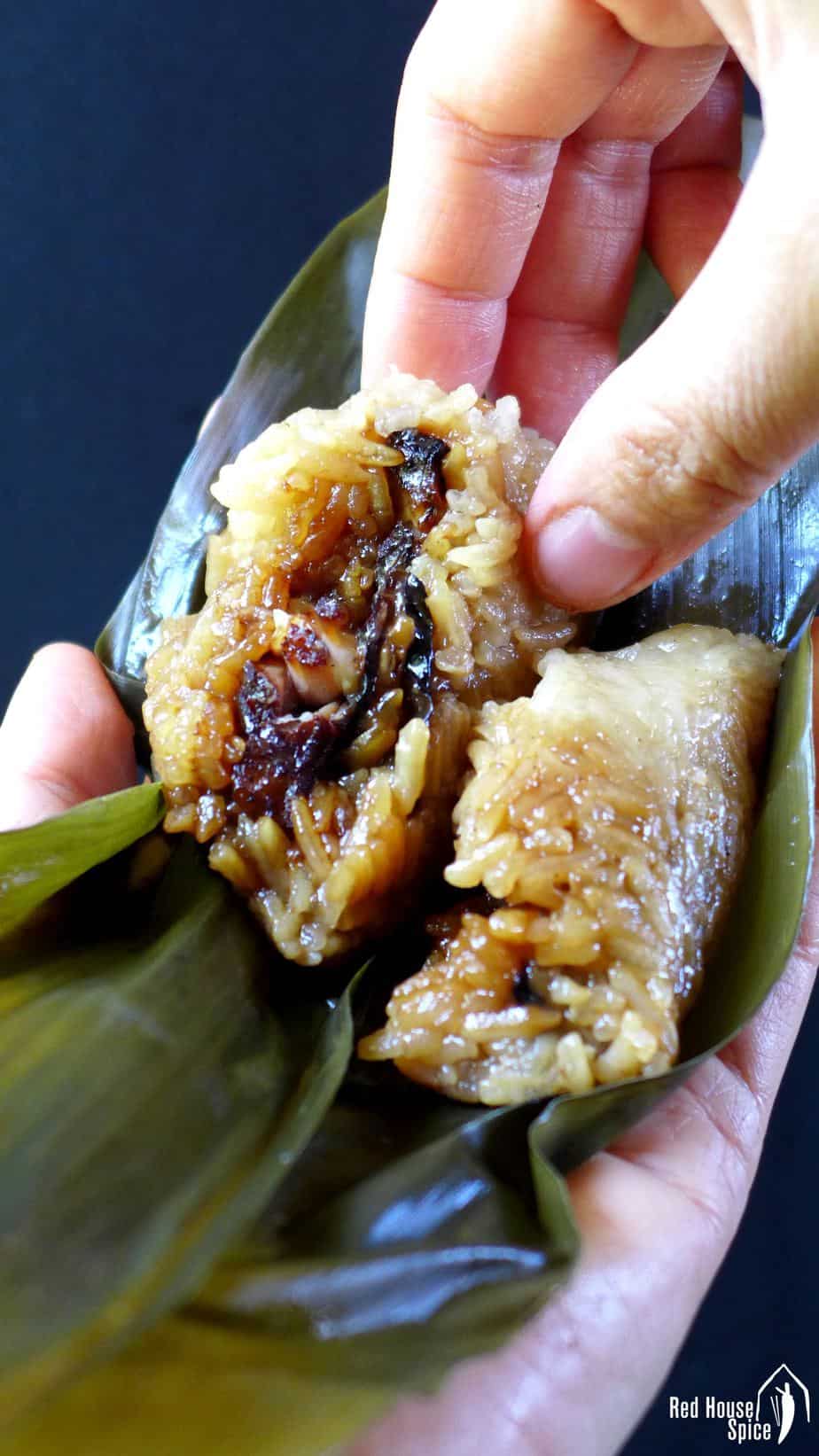 A unwrapped sticky rice dumpling filled with pork & mushrooms